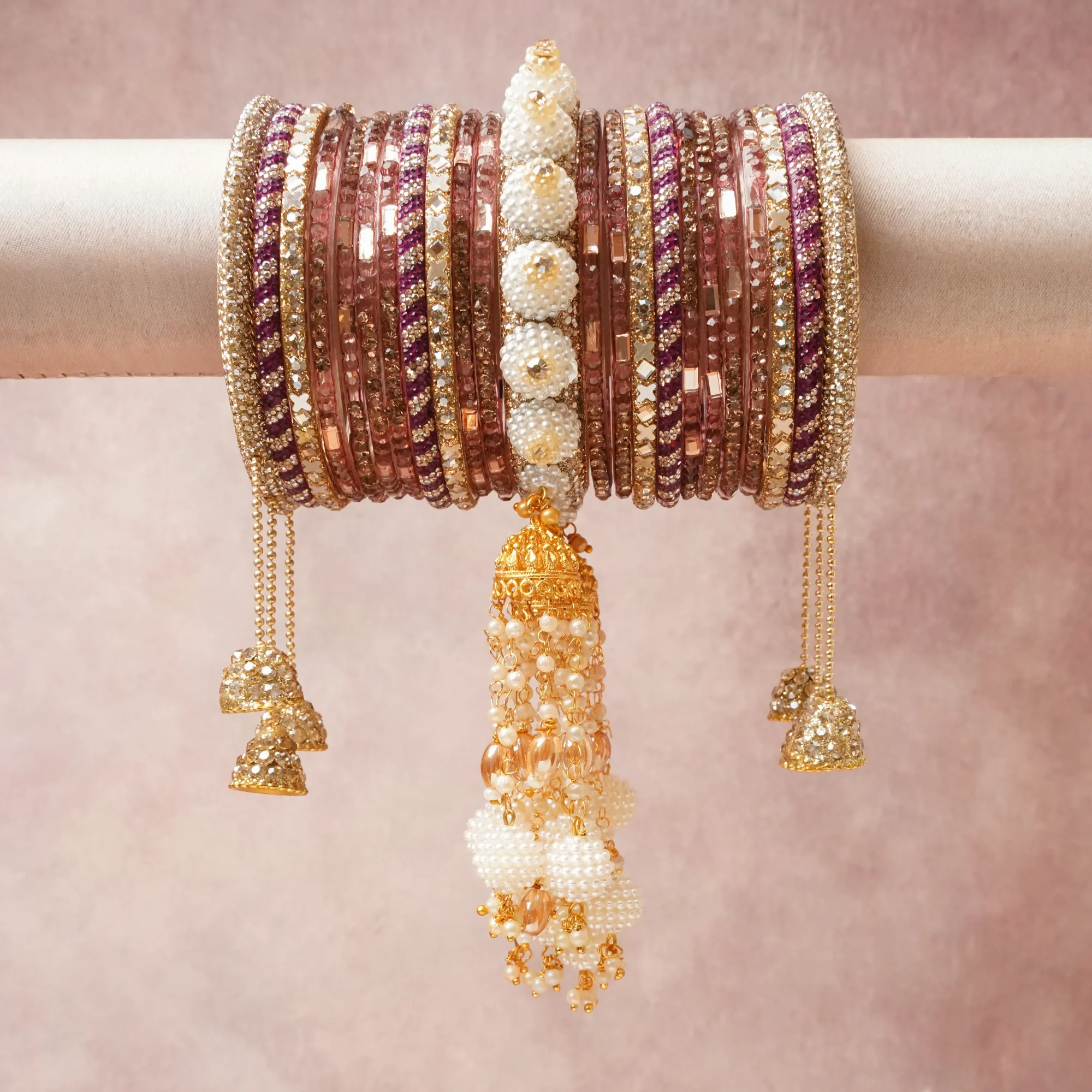 A majestic Plum set, complemented by Cream featuring Glass, Metal Alloy, Faux Pearls, Crystals, Textile Thread.
Rich, ceremonial, and designed to be passed through generations.